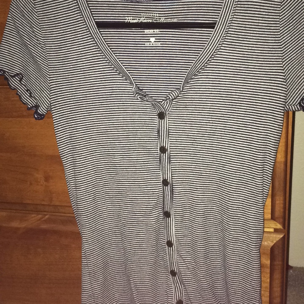 Hollister Navy Blue and White striped top.